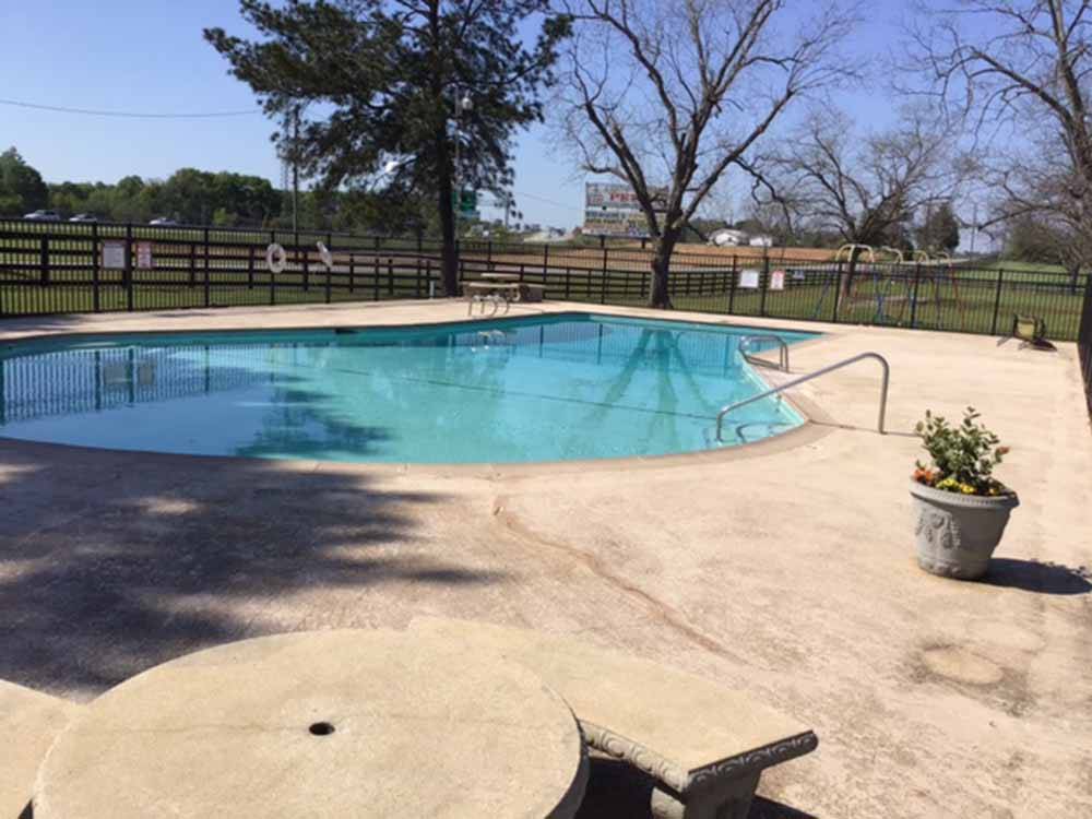 The swimming pool area at SOUTHERN TRAILS RV RESORT