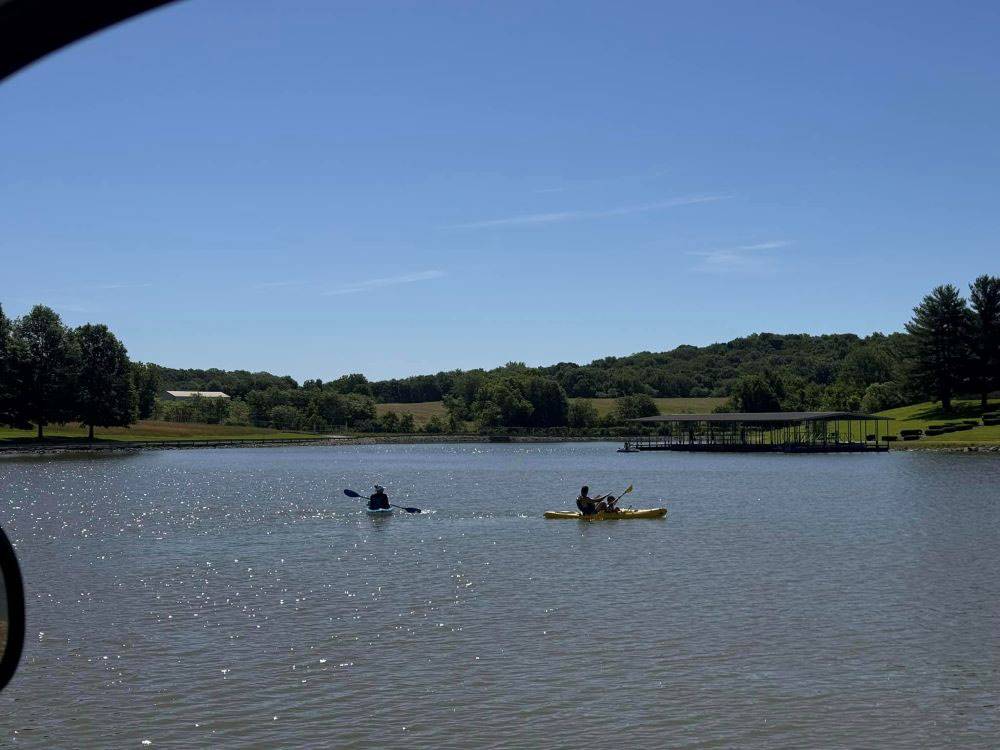 Kayakers in the water at Heavenly Hills Resort