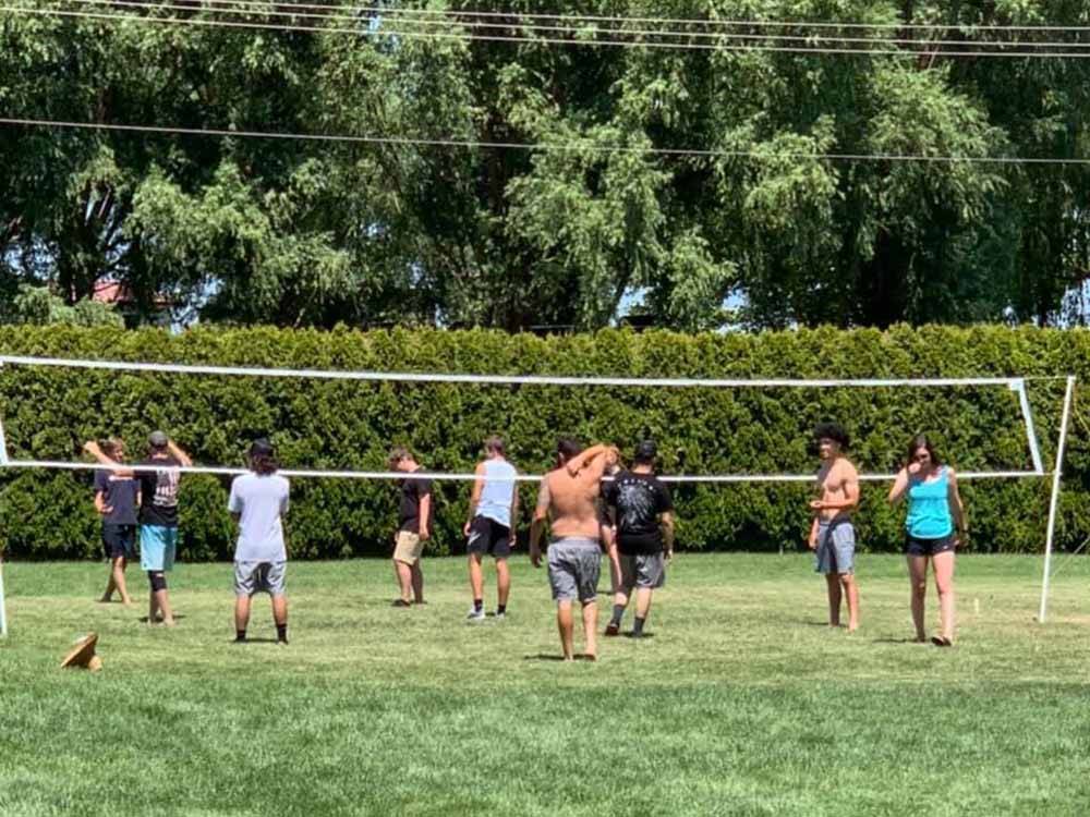 People playing volleyball at O'SULLIVAN SPORTSMAN RESORT (CAMPING RESORT)