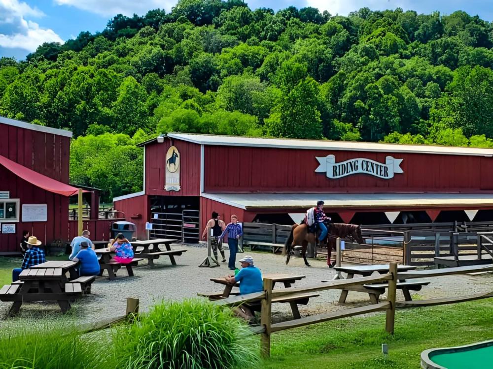 Horses and people at rec center at Rocky Fork Ranch Resort