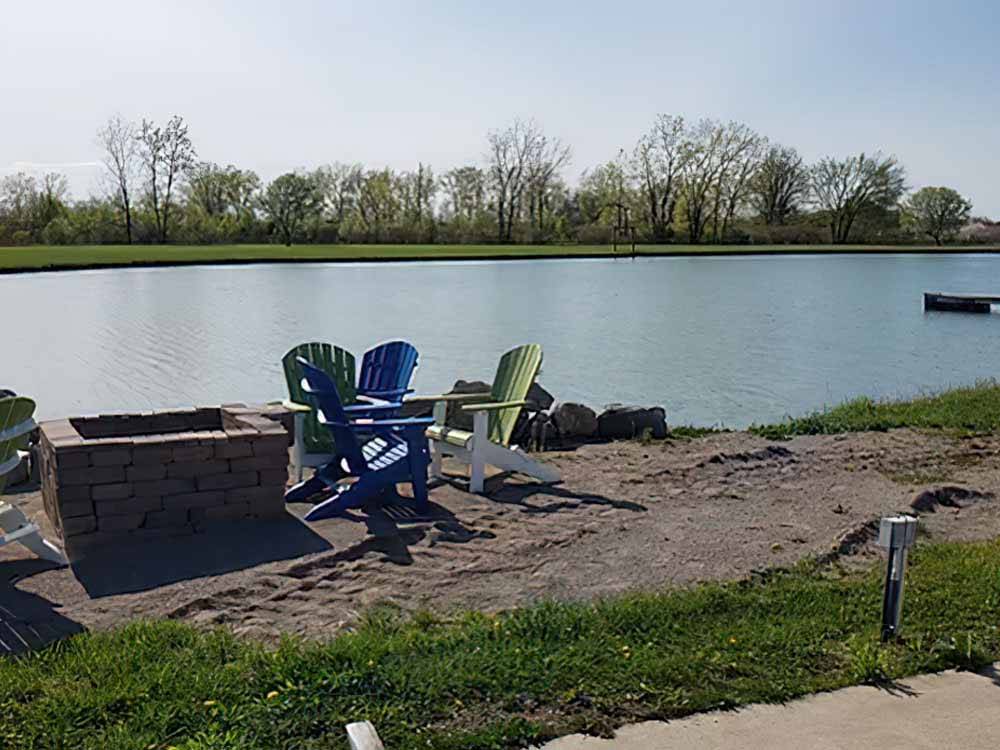 Chairs set up next to the water at THE RESORT AT ERIE LANDING