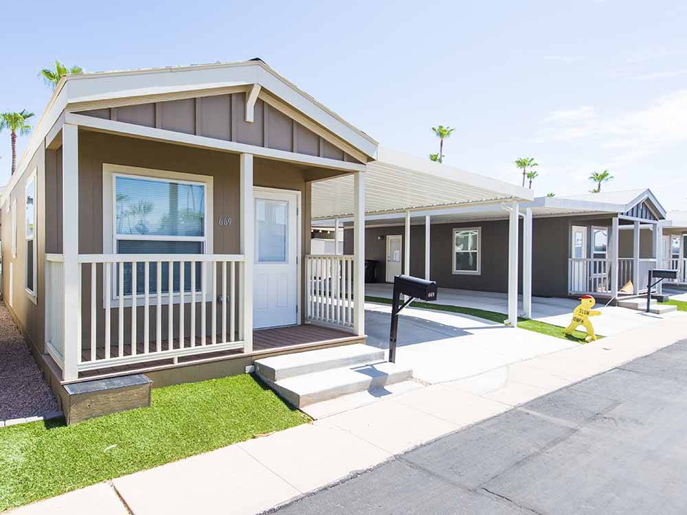 A row of new manufactured homes at PALM GARDENS MHC & RV PARK