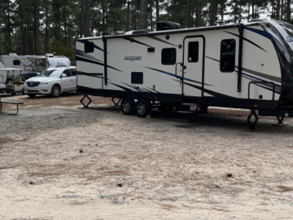 trailer in RV site at Sycamore Lodge Resort