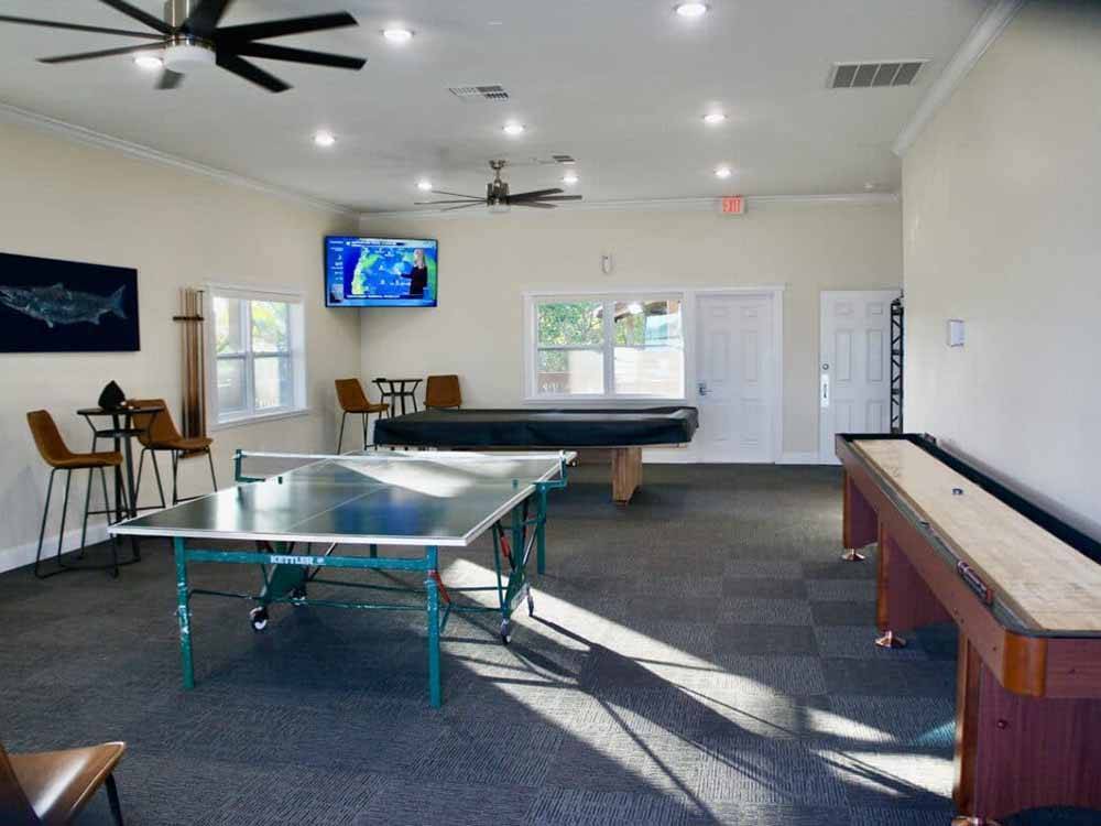 The indoor game room at FISHERMAN'S COVE WATERFRONT RV RESORT