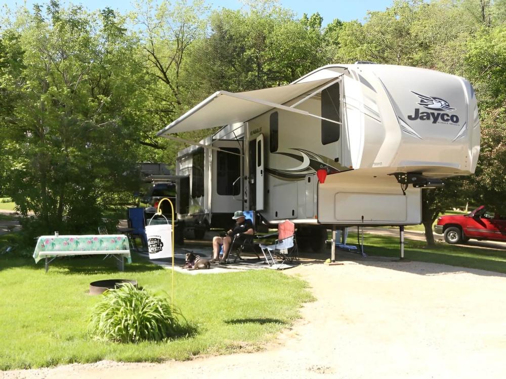 Parked trailer at site Glacier Valley Campground
