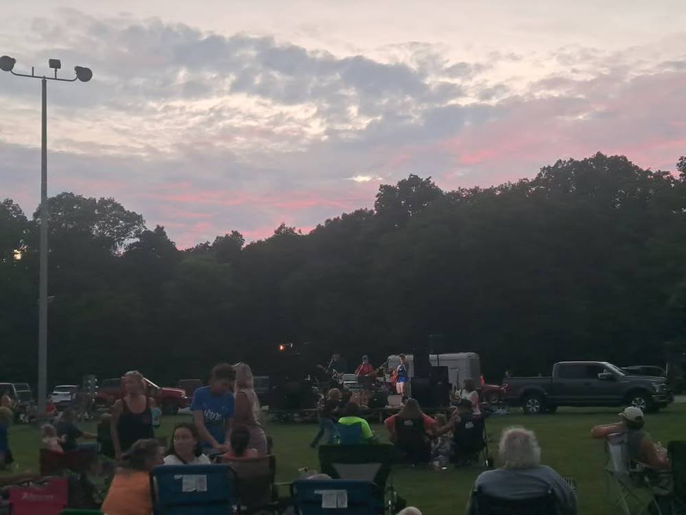 Campers at an outdoor concert