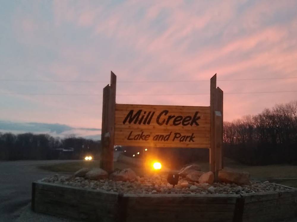 The park sign at sunset