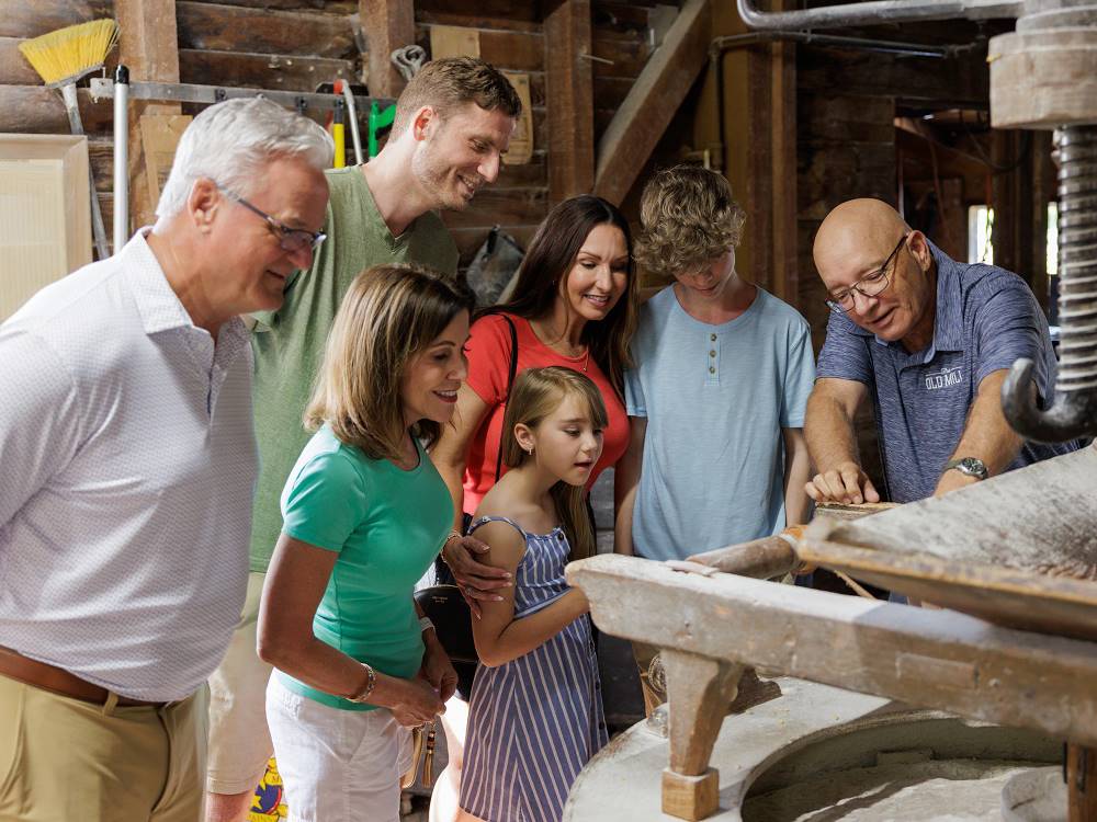 Group of people on a mill tour at Pigeon Forge Department Of Tourism