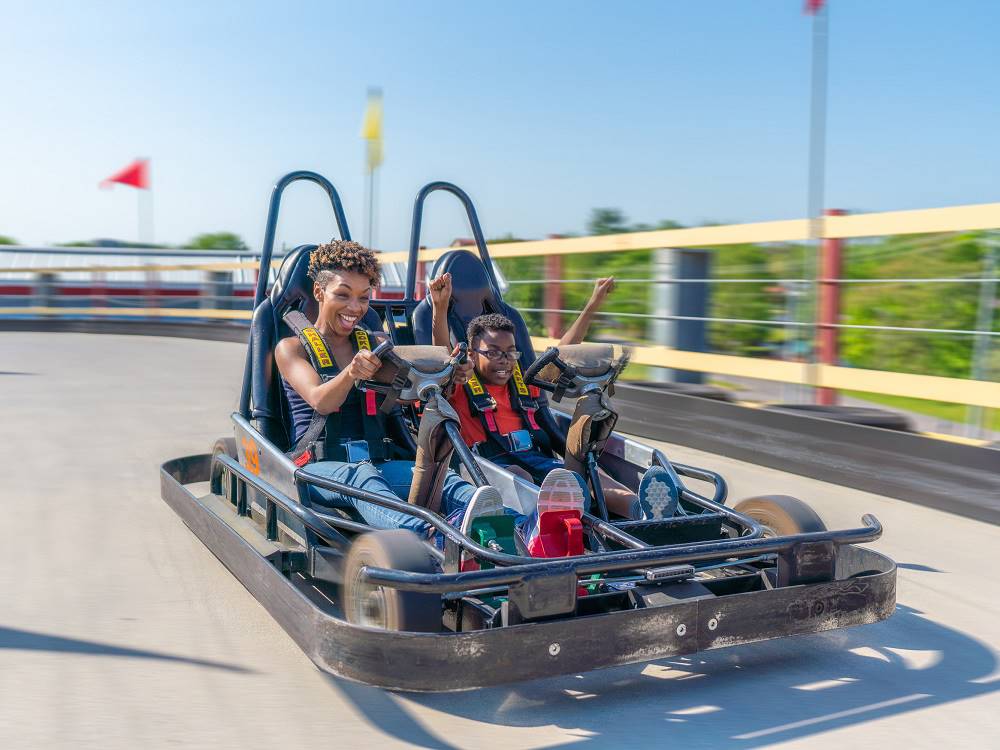 Mother and son riding a go kart at Pigeon Forge Department Of Tourism