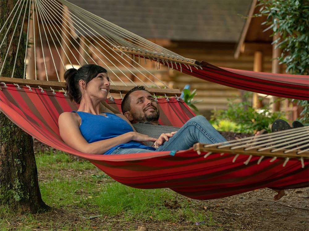 A couple swings on a hammock at Pigeon Forge Department Of Tourism