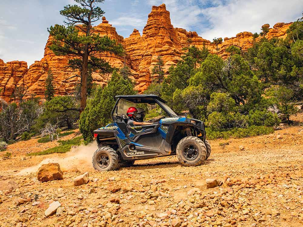 OHV traversing rugged desert terrain at GARFIELD COUNTY OFFICE OF TOURISM