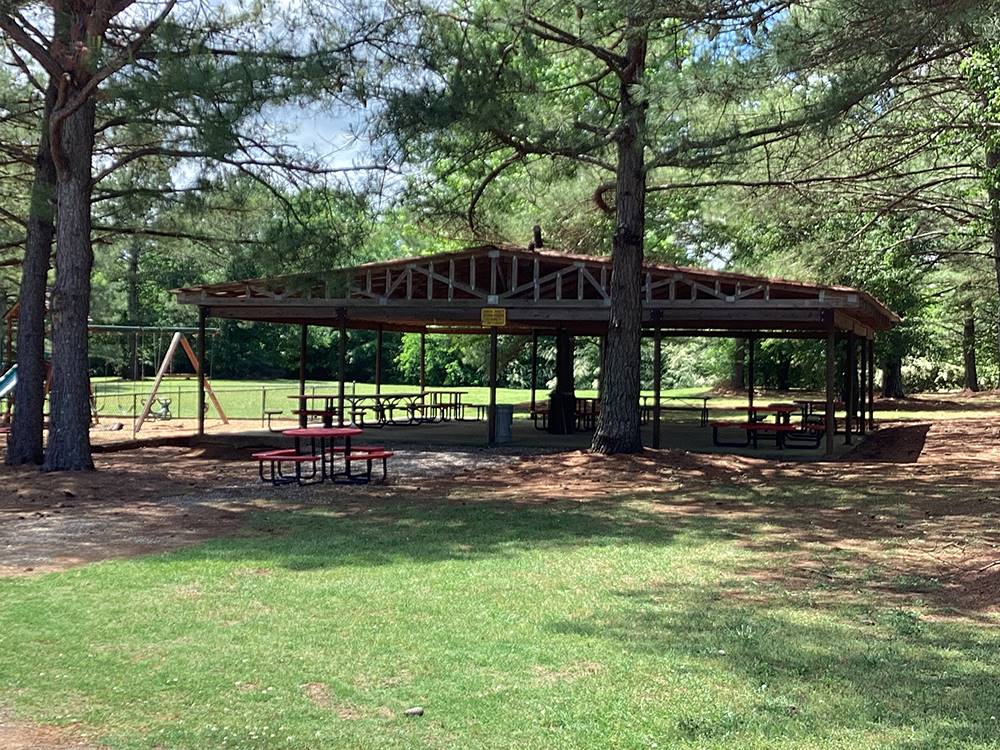 Pavilion next to a playground at Camping World-Campground of Oxford