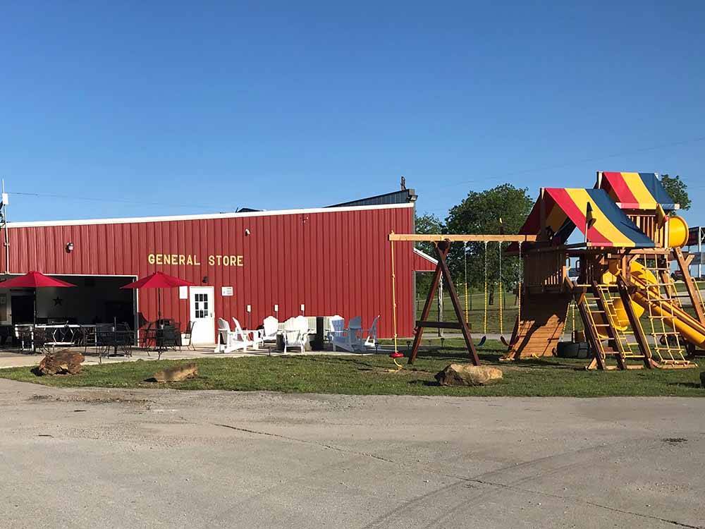 The general store and playground equipment at TULSA RV RANCH