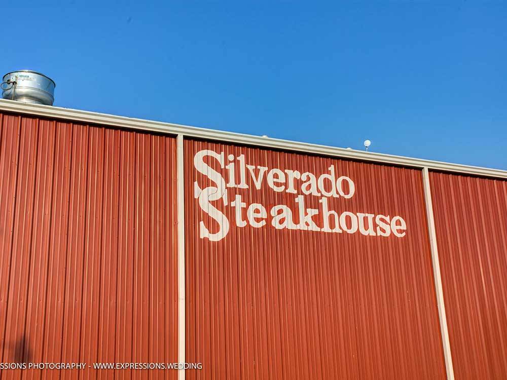 Red building with Silverado Steakhouse painted on the side at TULSA RV RANCH
