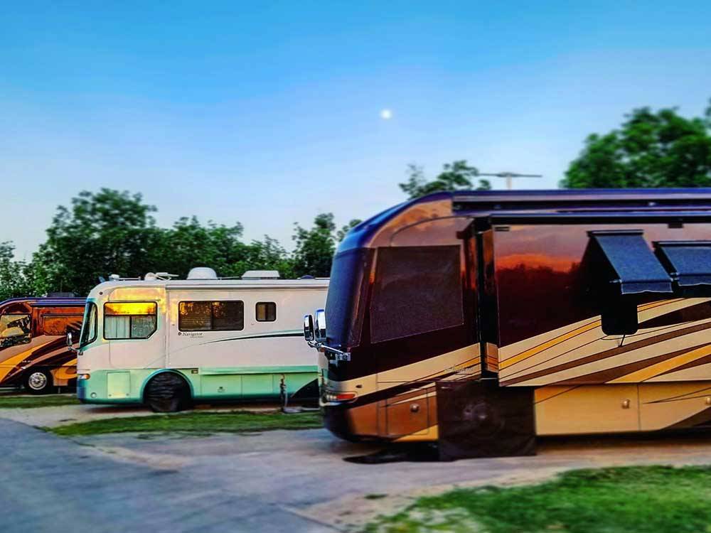 Motorhomes of varying color in campsites at TULSA RV RANCH