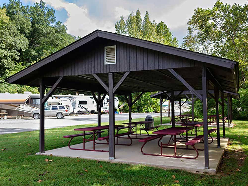 Patio area with picnic tables at BLOWING SPRINGS RV PARK