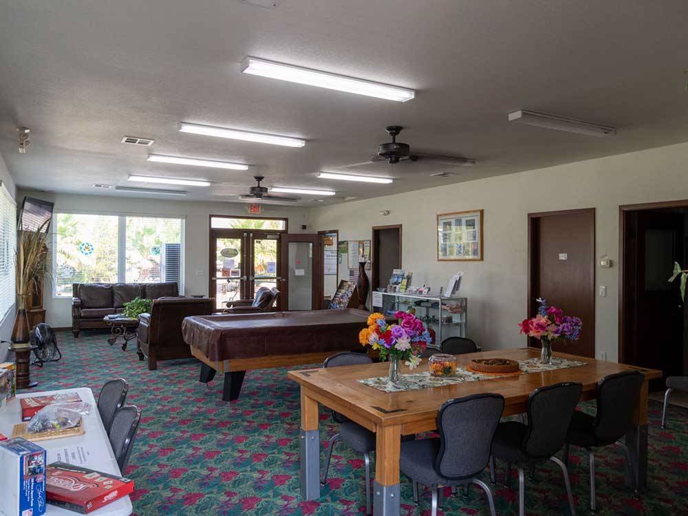 Rec room with pool table and games at SUN RESORTS RV PARK