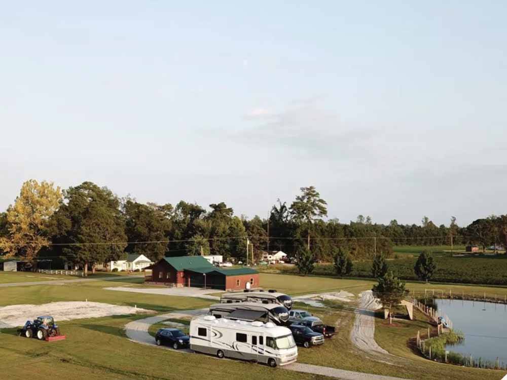 An aerial view of the lake and campsites at FARM COUNTRY CAMPGROUND