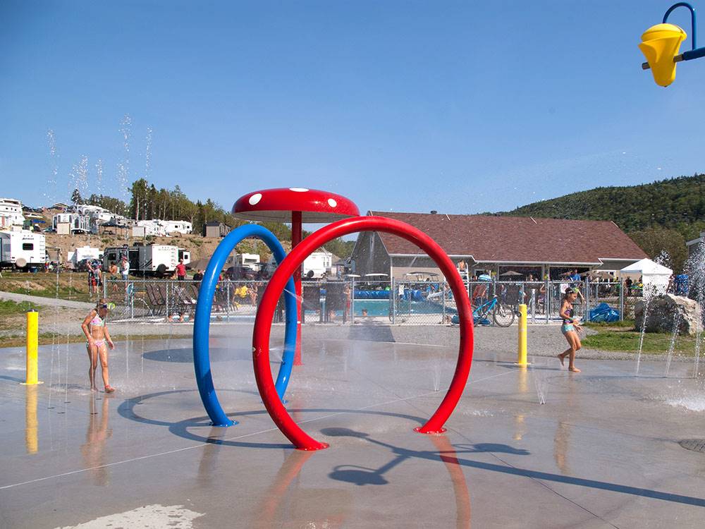 Colorful rings in splash pad at Bas-St-Laurent Campground