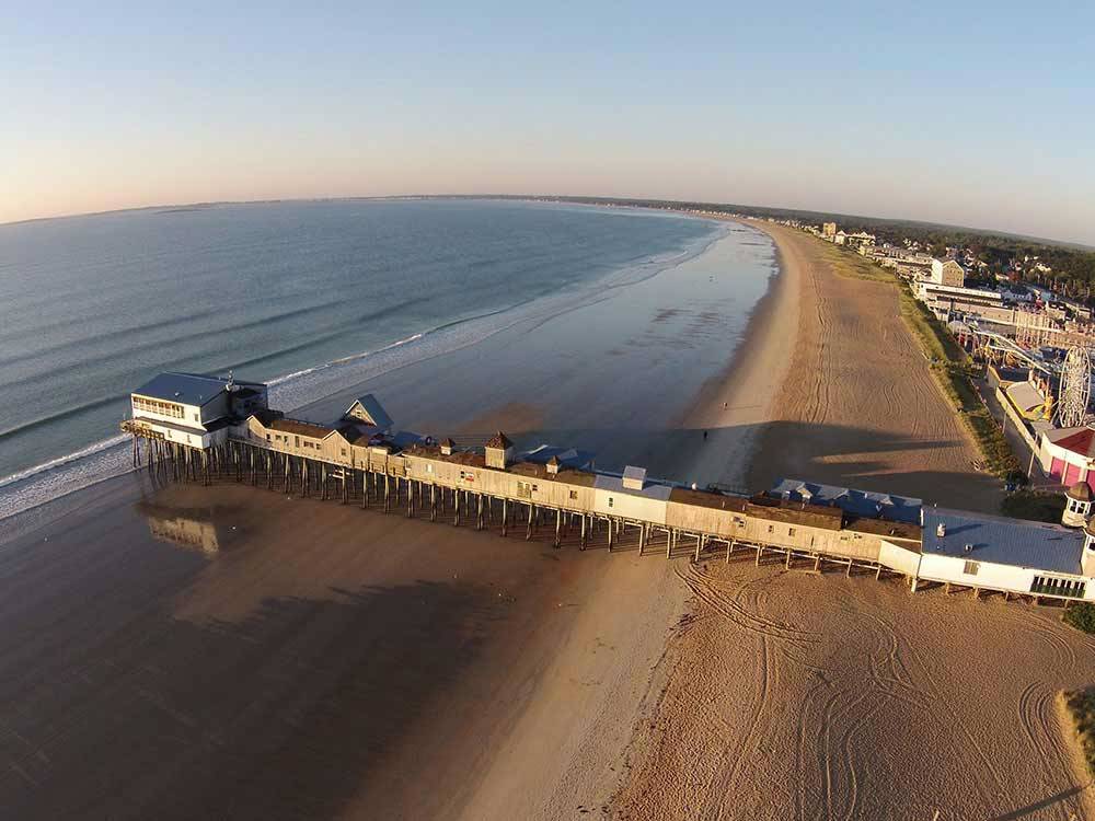 Aerial view of the beach and pier at OLD ORCHARD BEACH CAMPGROUND