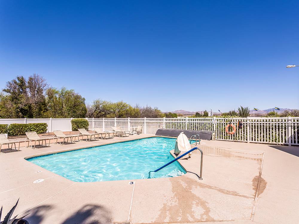 Pool and lounge chairs at ENCORE VALLEY VISTA