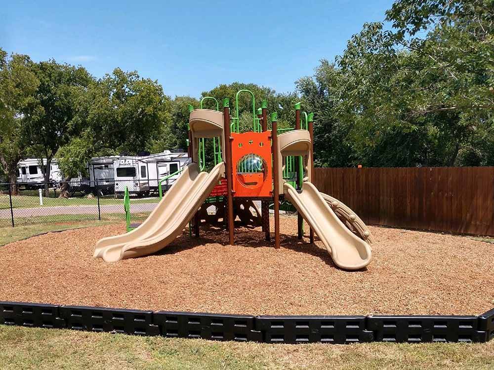 The playground equipment at PECAN GROVE RV RESORT