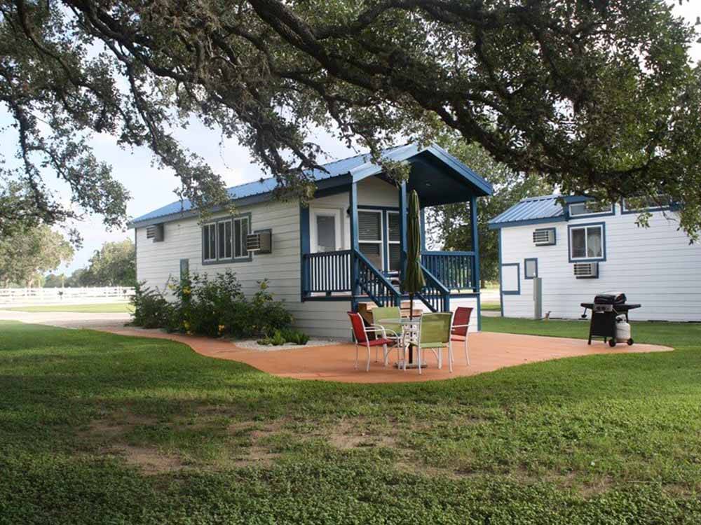 One of the many camping cabins at VICTORIA COLETO LAKE RV RESORT