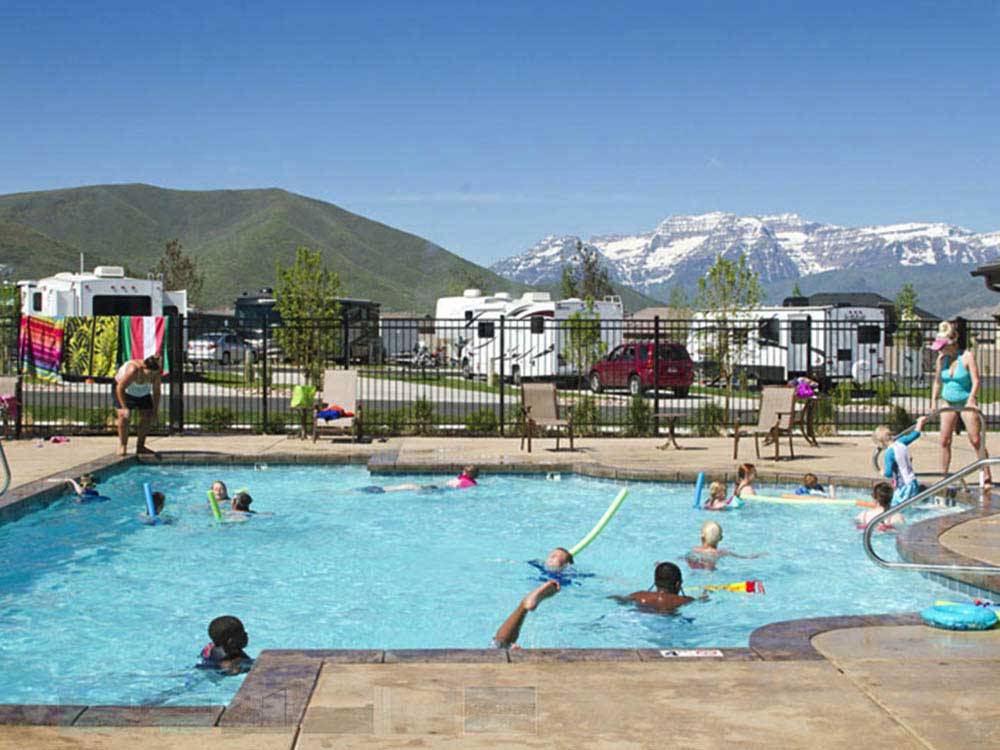 Kids swimming in pool at MOUNTAIN VALLEY RV RESORT