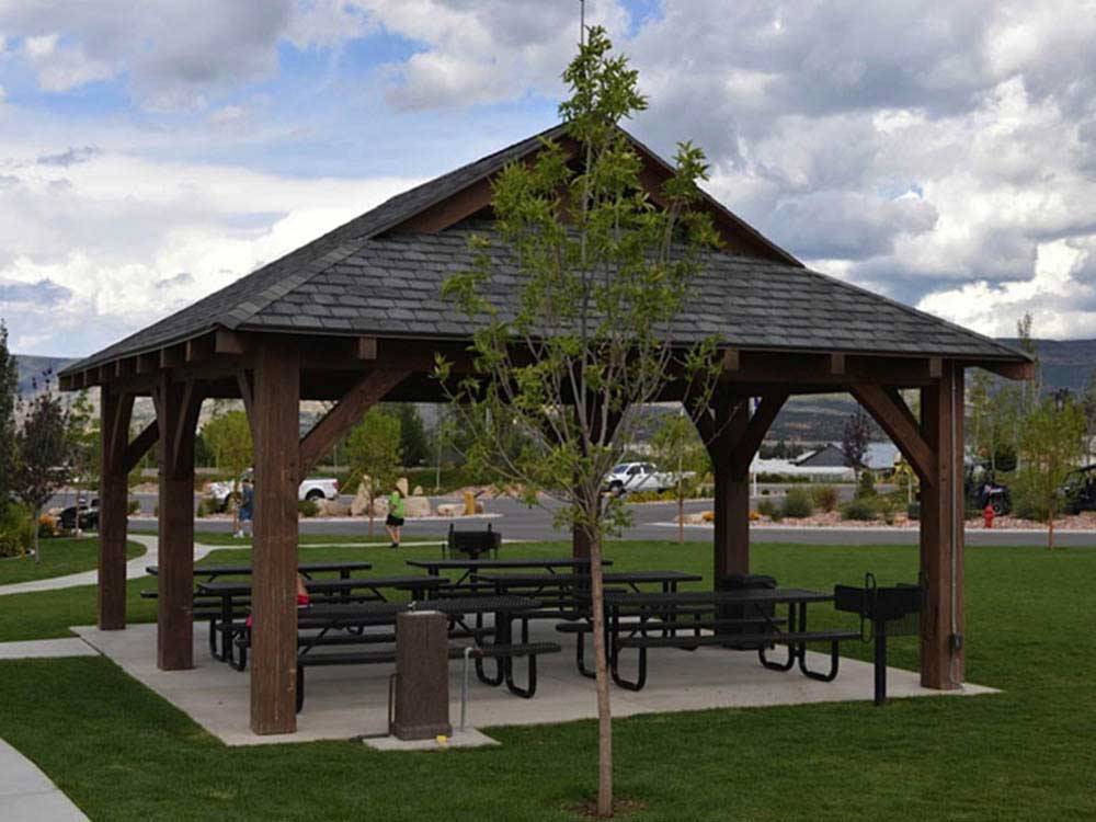 Patio area with picnic tables at MOUNTAIN VALLEY RV RESORT