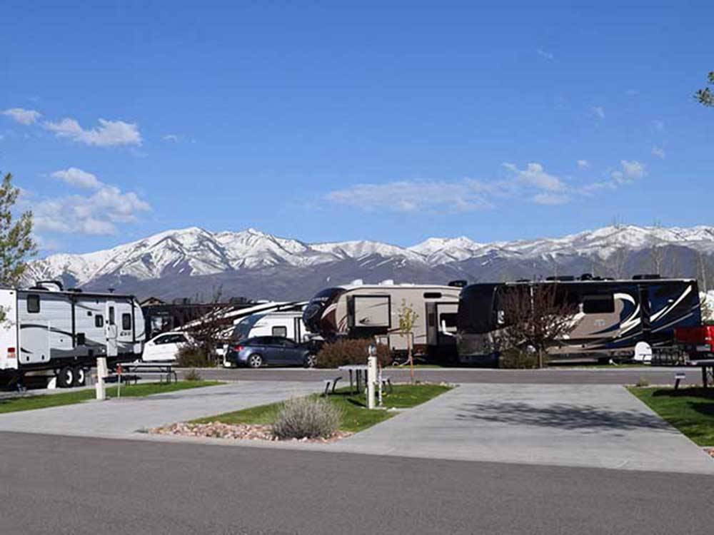 Two empty concrete RV sites at MOUNTAIN VALLEY RV RESORT