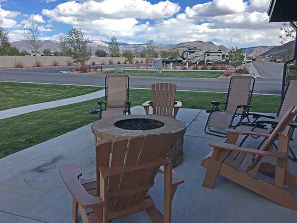A fire pit with seating at MOUNTAIN VALLEY RV RESORT