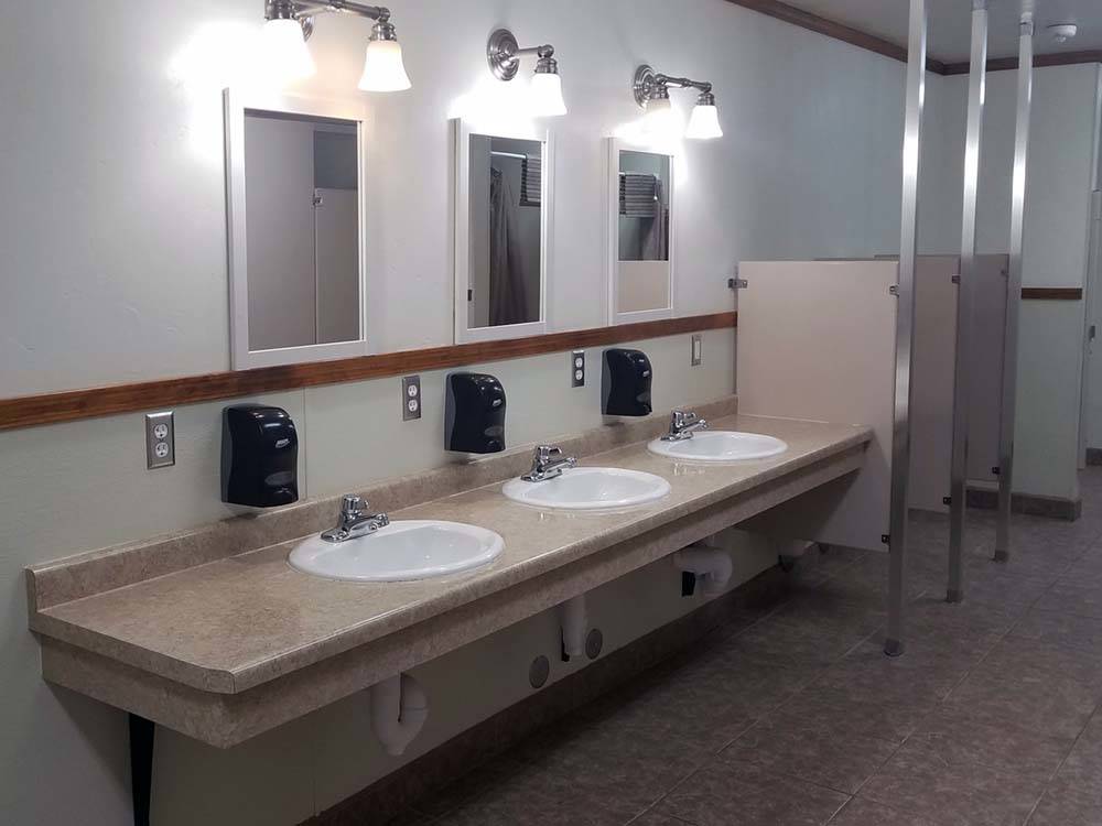 The clean restroom sinks at HOMESTEAD RV PARK