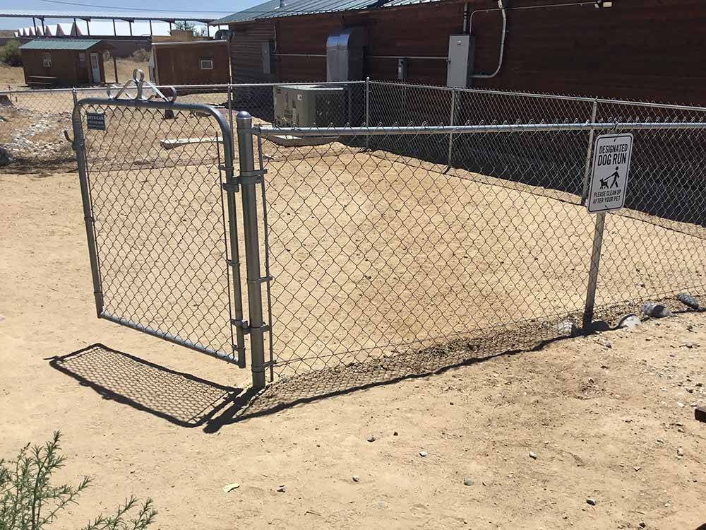 The fenced in pet area at HOMESTEAD RV PARK