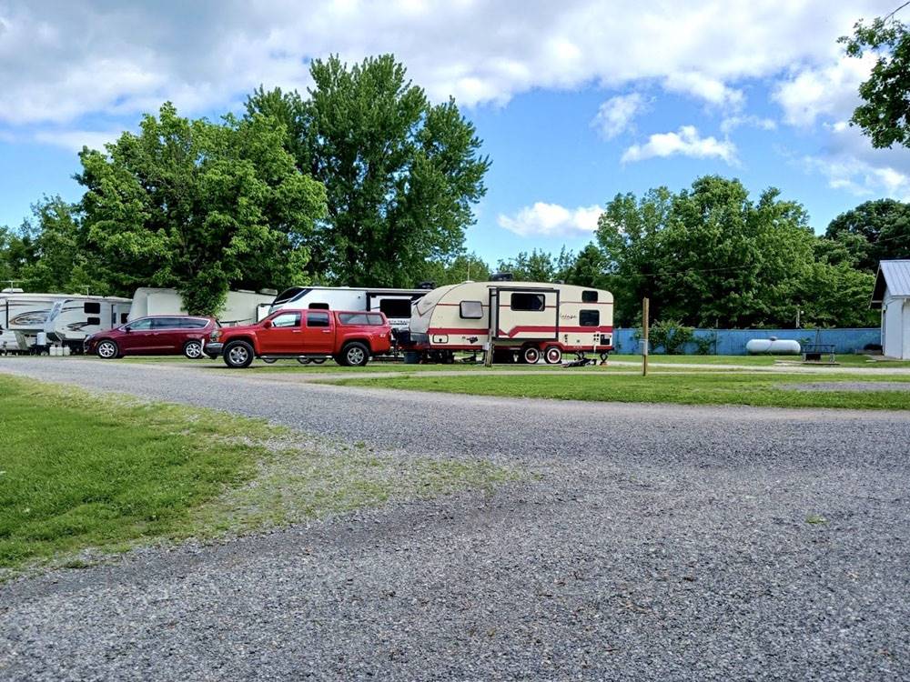A gravel road that leads to RV sites