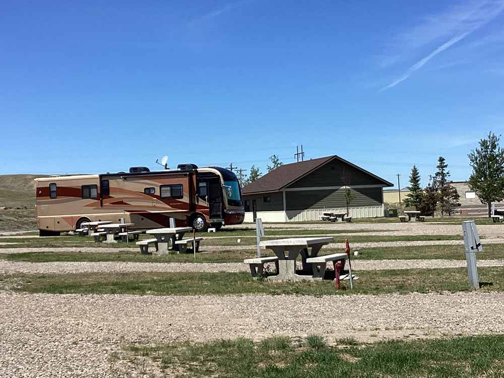 A row of gravel RV sites at TRAILS WEST RV PARK