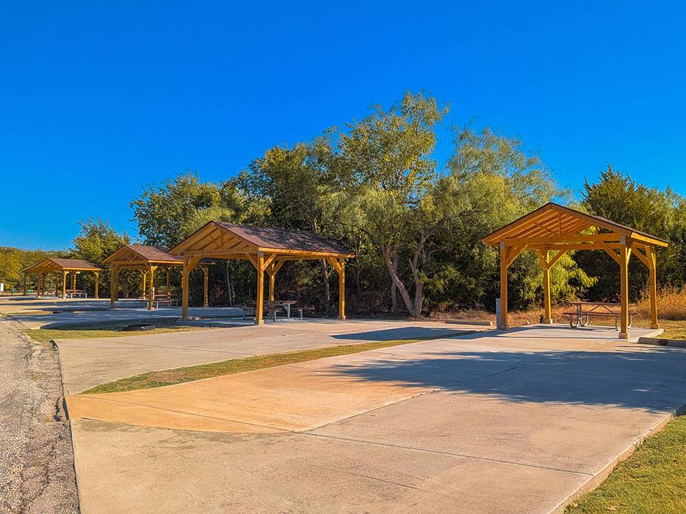 Paved RV sites, each with covered picnic table at Hidden Cove Park