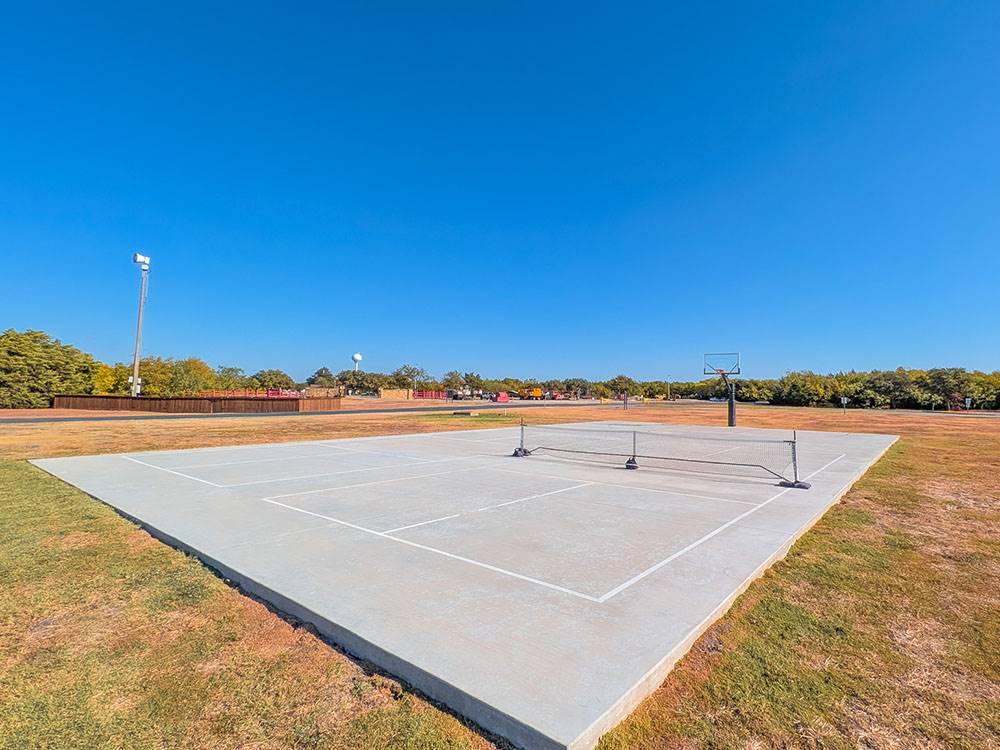 A combination tennis and basketball court at Hidden Cove Park