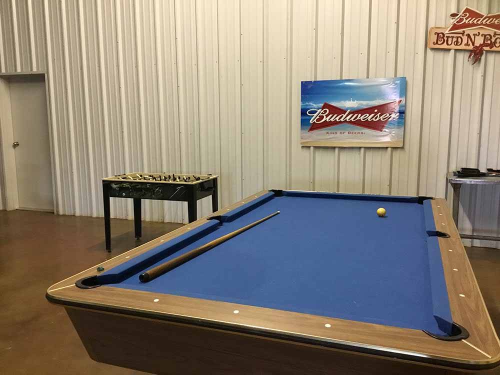 The blue pool table in the rec hall at NORTH POINT RV PARK