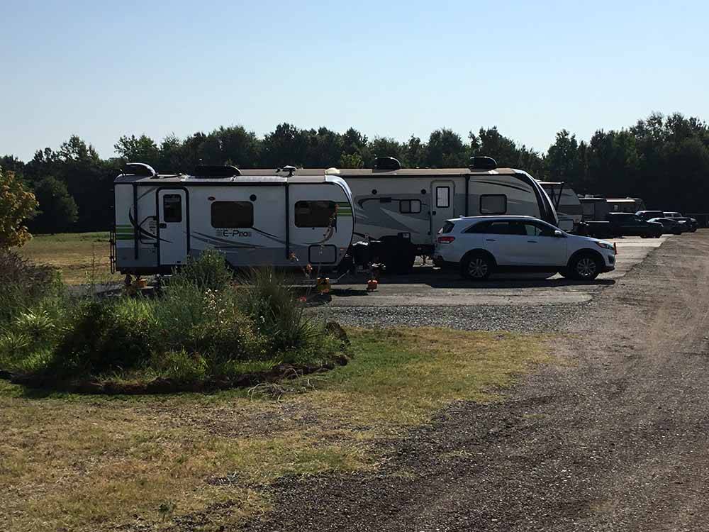 A row of filled RV sites at NORTH POINT RV PARK