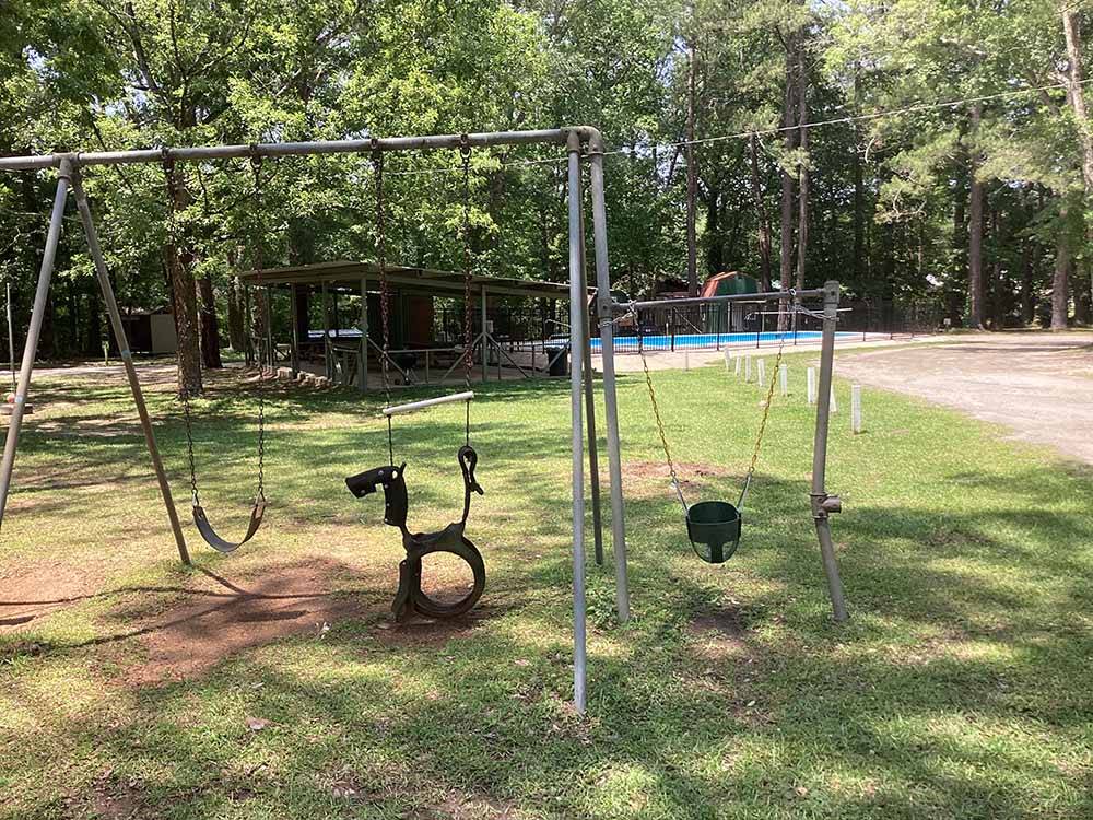 The swing set next to the pavilion at LAKE EUFAULA CAMPGROUND