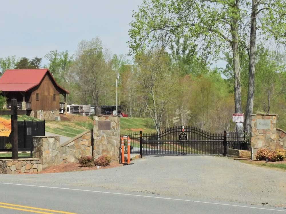 The front entrance gate at GREYSTONE RV PARK