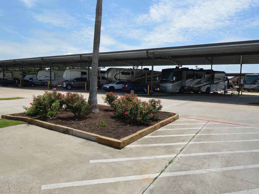 Some of the covered RV storage at KATY LAKE RV RESORT
