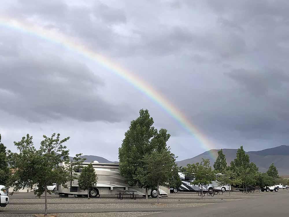 A rainbow over the campsites at NEW FRONTIER RV PARK