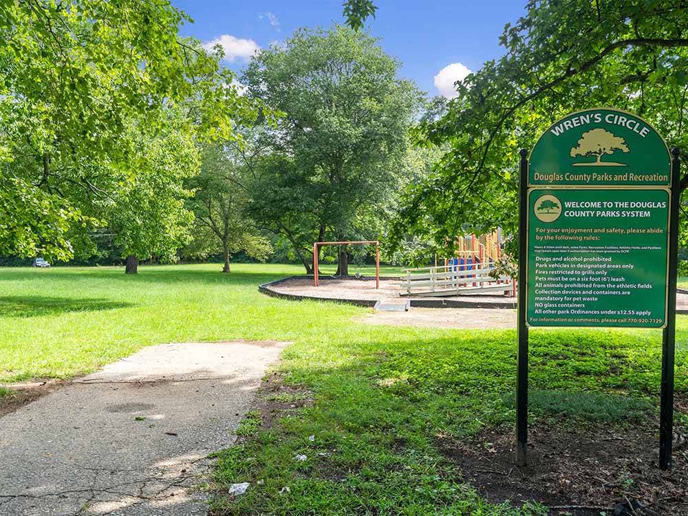 Sign indicating Wren's Circle in park setting at SWEETWATER CREEK RV RESERVE