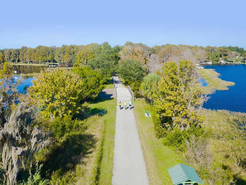 An aerial view of three people bicycling at DISCOVER CRYSTAL RIVER