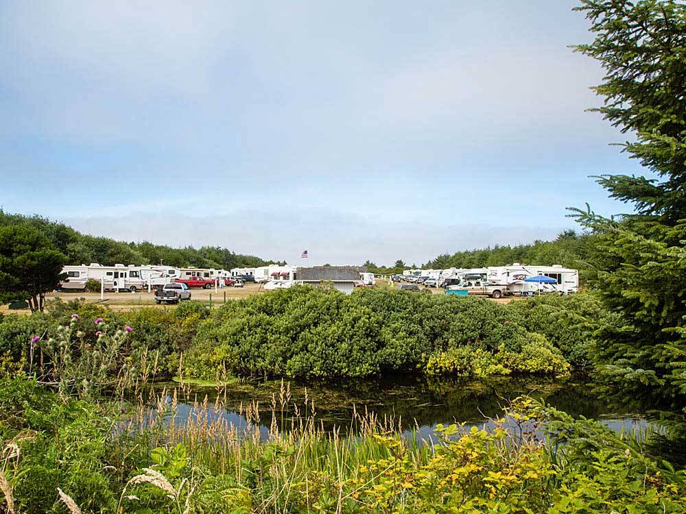 RVs and trailers at campground at THOUSAND TRAILS OCEANA