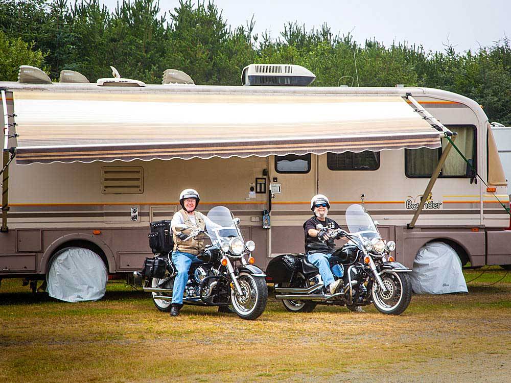 RV and men riding motorcycles at THOUSAND TRAILS OCEANA