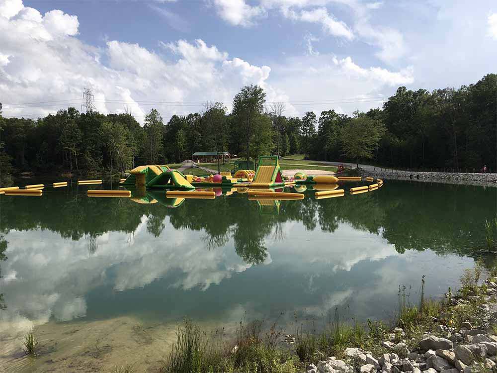 The inflatable play equipment on the lake at LAUREL LAKE CAMPING RESORT