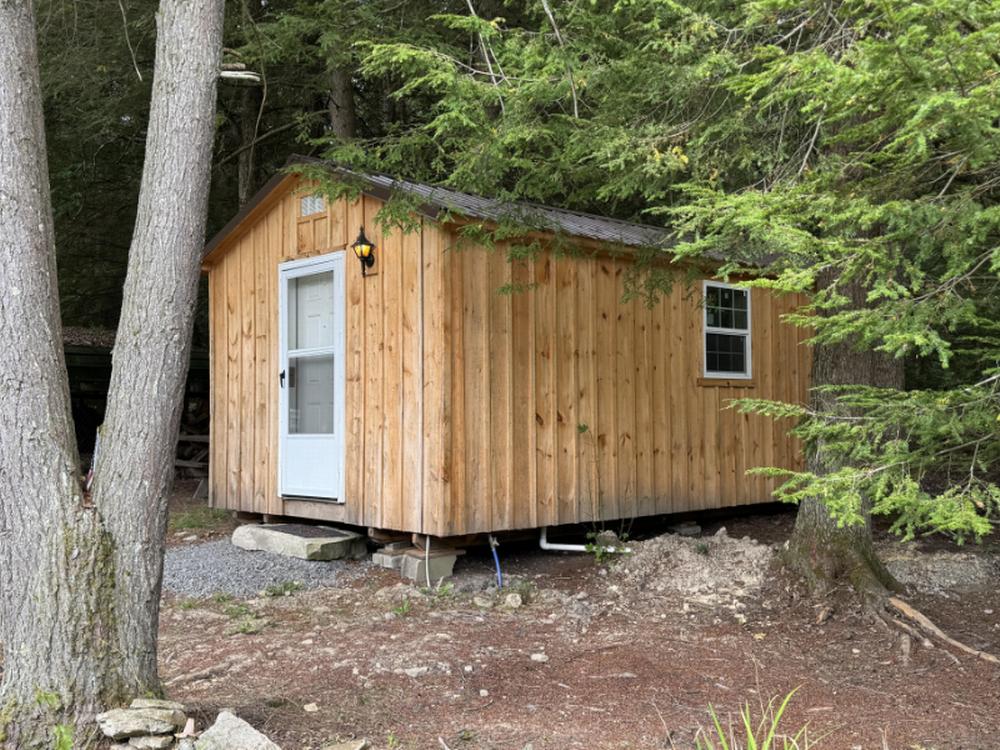 A little cabin nestled in the trees