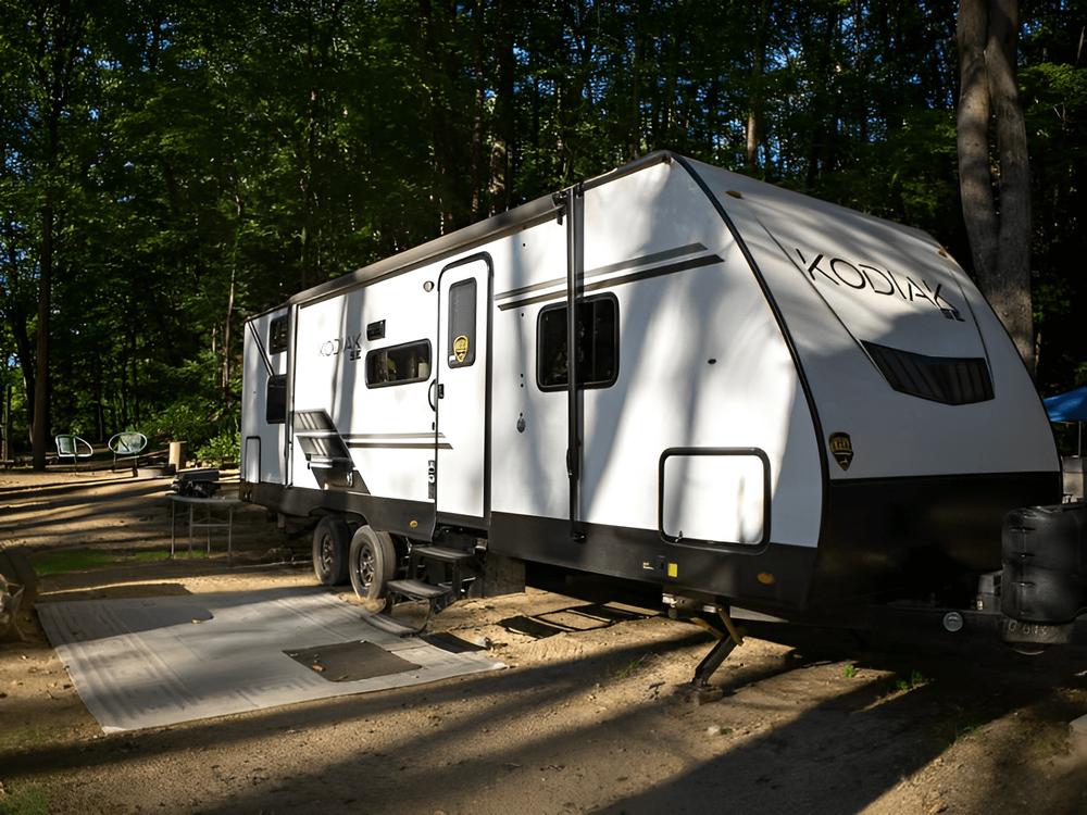 A travel trailer in a site